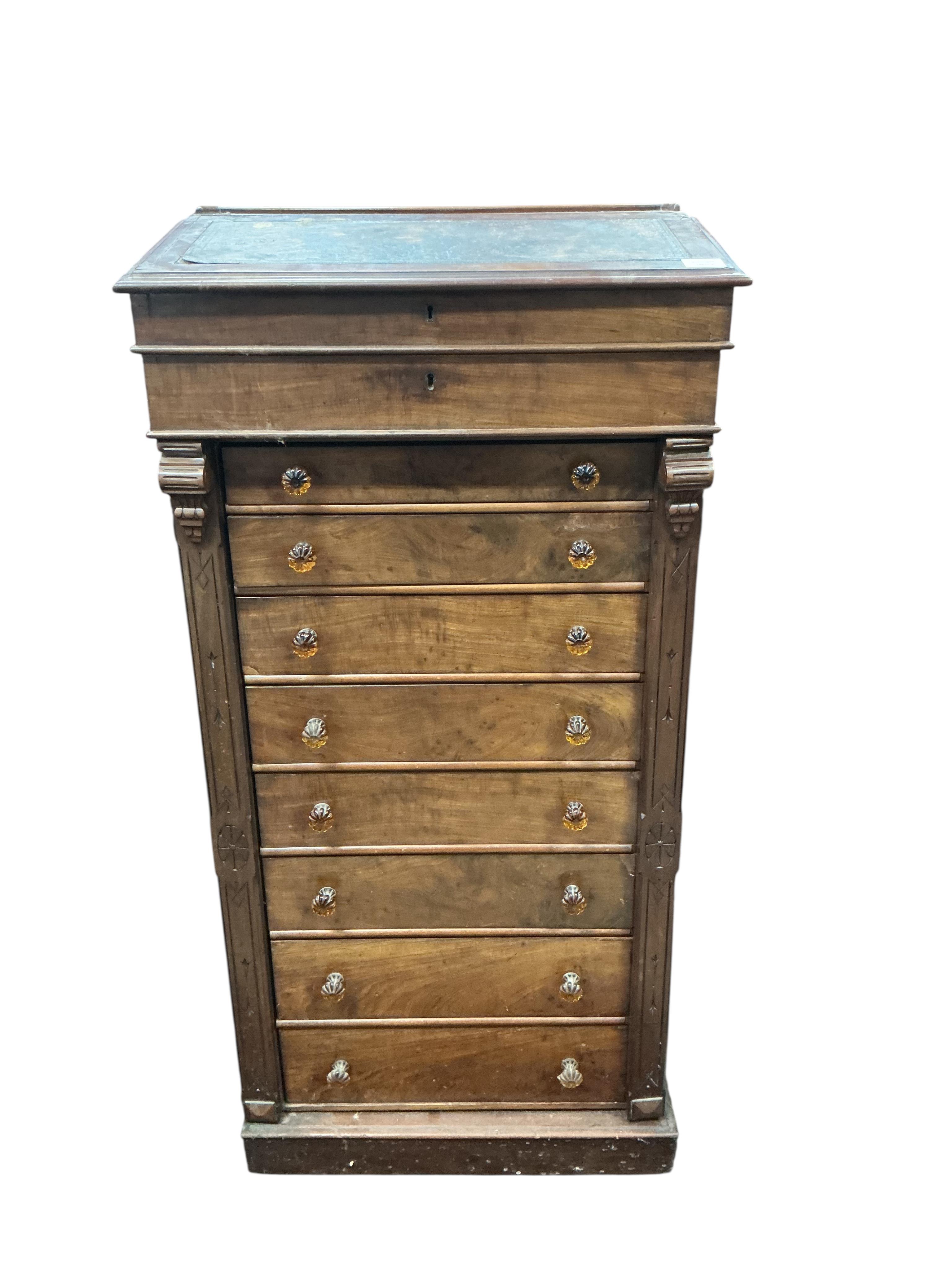 A Victorian mahogany Wellington chest, with writing slope superstructure, width 63cm, depth 40cm, height 130cm